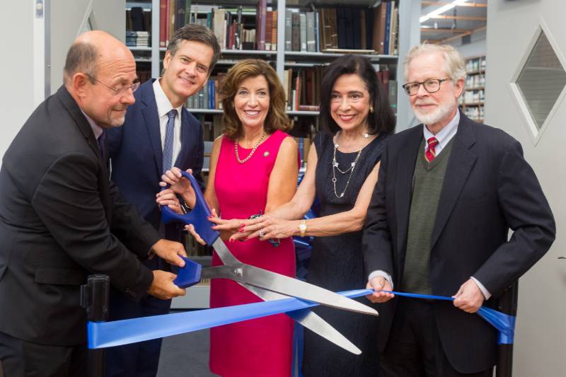 Group of people at a ribbon cutting