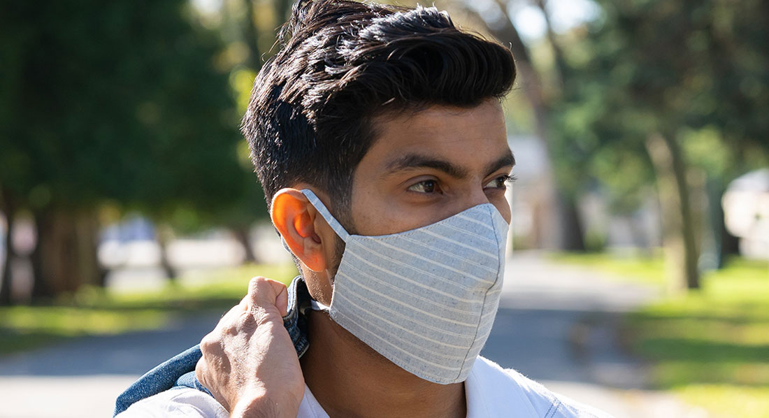 a male wearing a denim mask