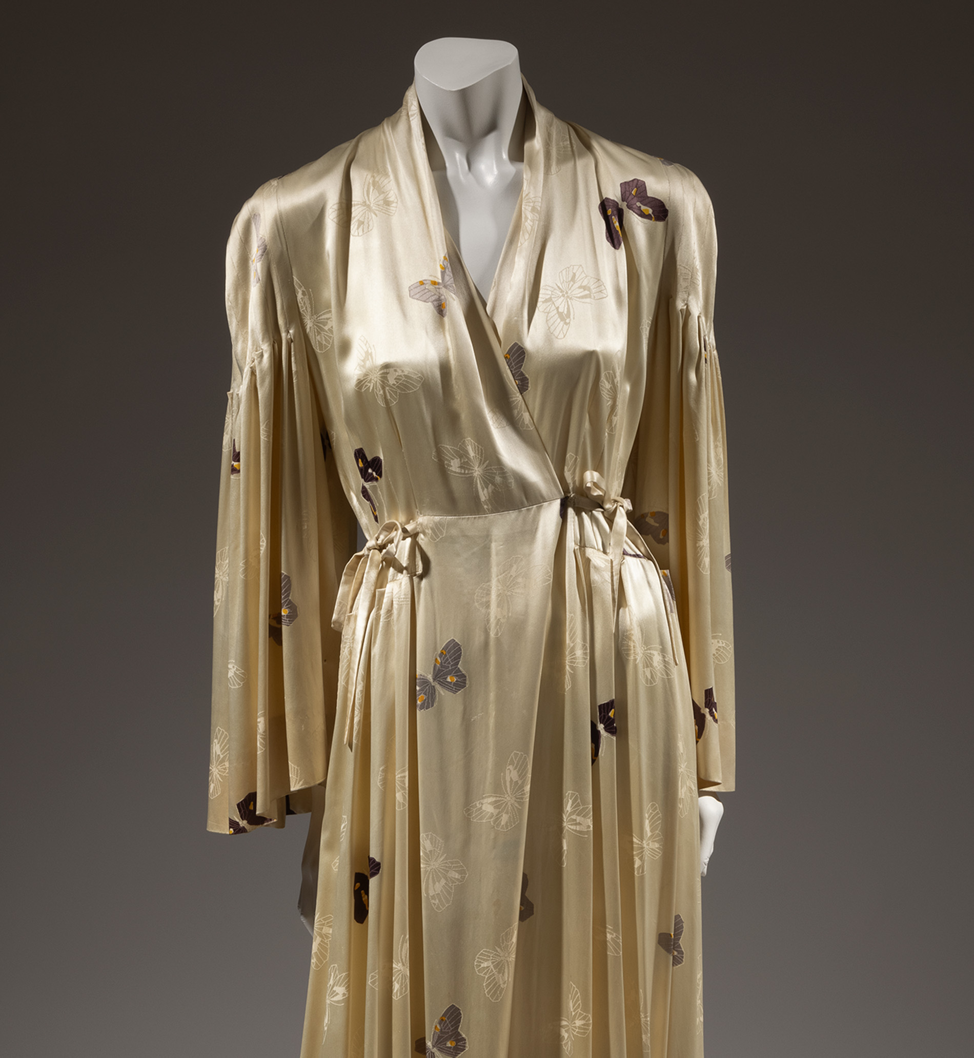 gold evening cape with blue butterflies by elsa schiaparelli