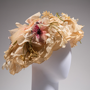 brimmed hat made entirely of artificial flowers and flower petals